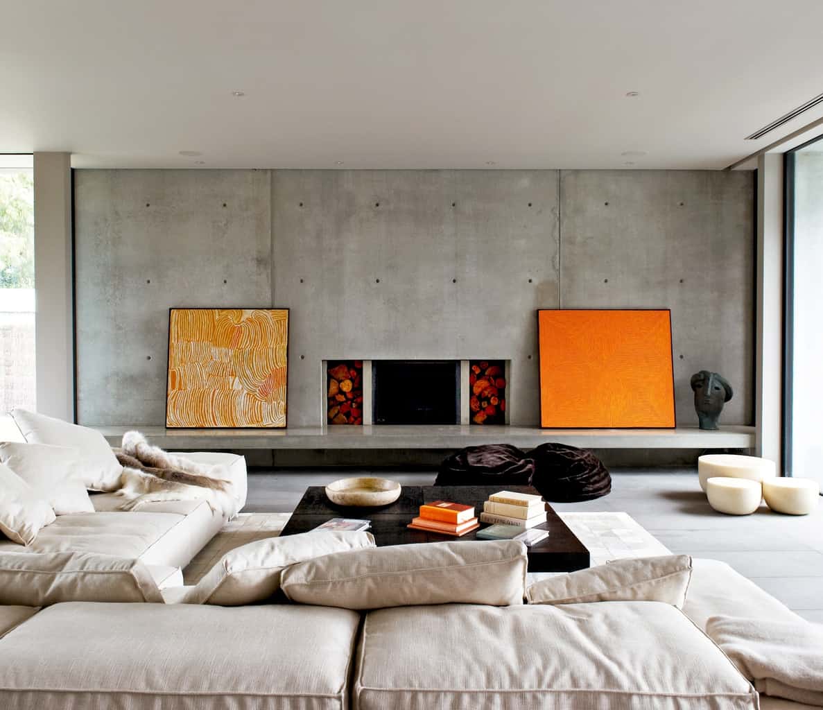 A palette of exposed concrete, honed basalt & hand hewn timber