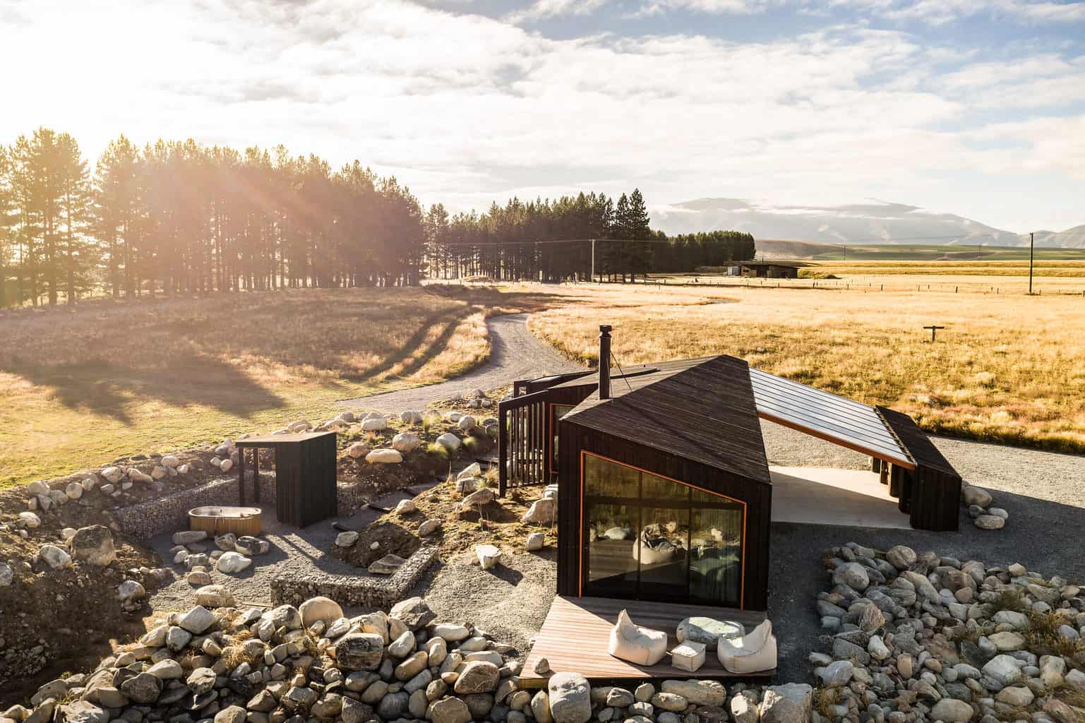 Striking black cabin immersed in nature